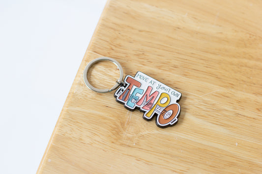 Move At Your Own Tempo Enamel Keychain